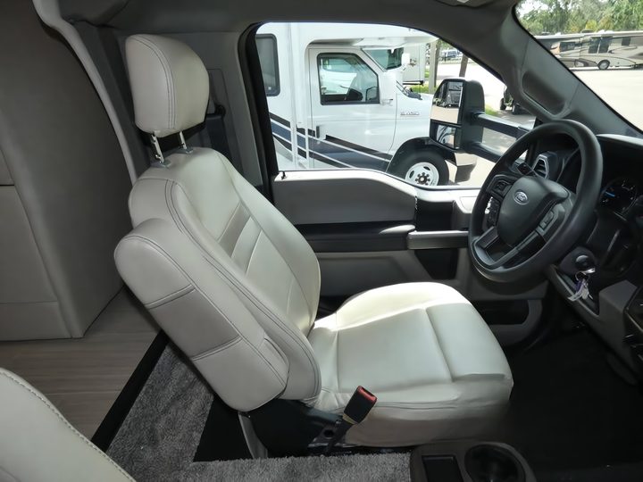 Cab, passenger seat